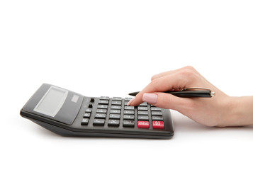 Woman's hands counts on the calculator
