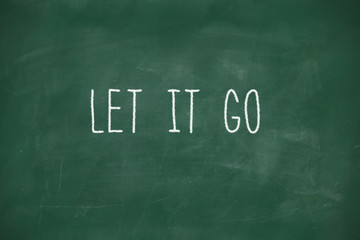 Let it go handwritten on blackboard