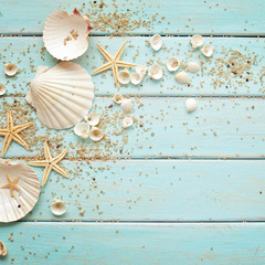 seashells frame on wooden background. nautical border 