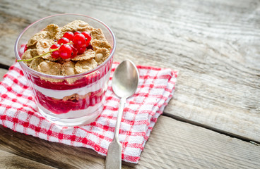 Wholegrain muesli with berry sauce and yogurt