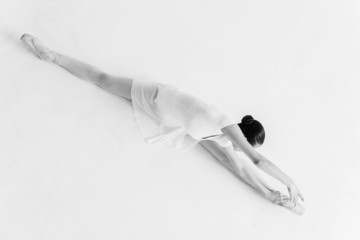 Ballerina stretching. © gstockstudio