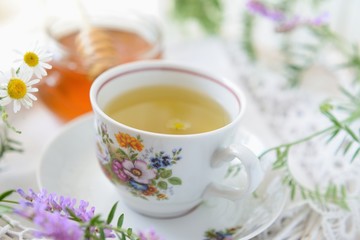 Obraz na płótnie Canvas Wildflower and chamomile tea