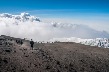 Group descending from summit of Kilimanjaro