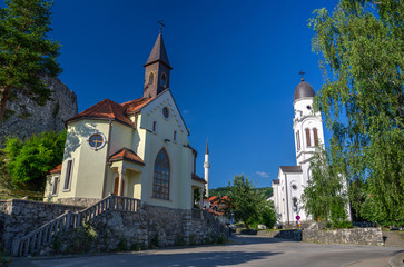 Fototapeta na wymiar Catholic church, Orthodox church and Mosque in Bosanska Krupa