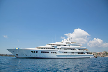 Fototapeta na wymiar Luxury large super or mega motor yacht in the blue sea.