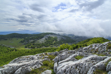 Beautiful mountain scenery in the Alps in summer and clouds