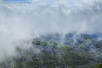 Beautiful mountain scenery in the Alps in summer and clouds