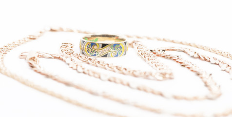 gold ring of gold chains