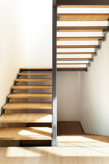 Front view of a wooden staircase in a modern house