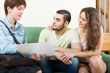 Adult couple on sofa in home