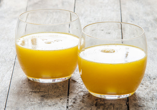 Glass of freshly pressed orange juice