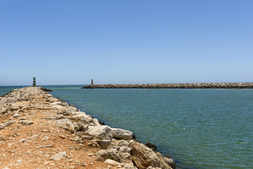 Fototapeta na wymiar Entrance to the Vilamoura harbor