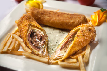 Rolled meat with French fries