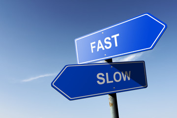 Fast and Slow directions.  Opposite traffic sign.