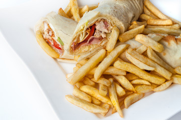 Rolled meat with French fries