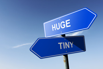 Huge and Tiny directions.  Opposite traffic sign.