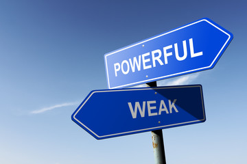 Fototapeta premium Powerful and Weak directions. Opposite traffic sign.