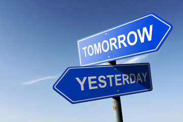 Tomorrow and Yesterday directions.  Opposite traffic sign.