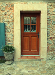 Fototapeta na wymiar Door of stone wall house, Provence, France