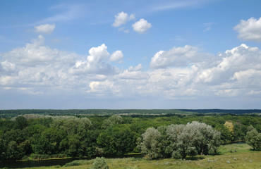 Summer landscape and cloudy sky