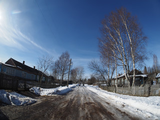 Fototapeta na wymiar road in winter village