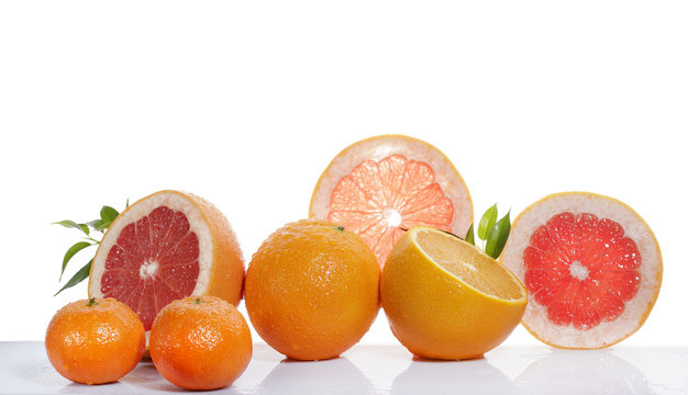 set of citrus fruit on white background