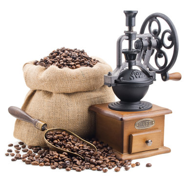 Fototapeta sack of coffee beans with retro grinder isolated on white