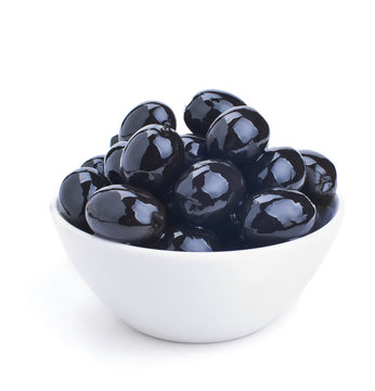 white ceramics bowl with black olives