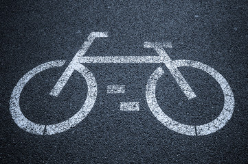 Bicycle road sign on asphalt