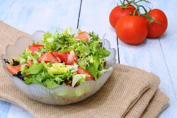 Lettuce and tomato salad.