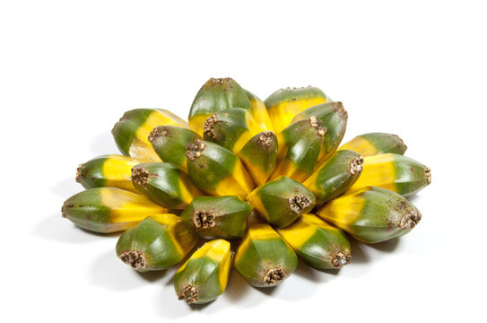 Arrangement of Green and Yellow Fruit of the Pandanas Palm