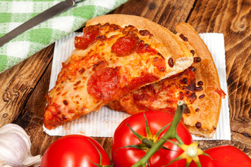 Two pieces of pizza.