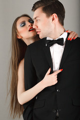 Fashion photo of sexy elegant couple in the tender passion