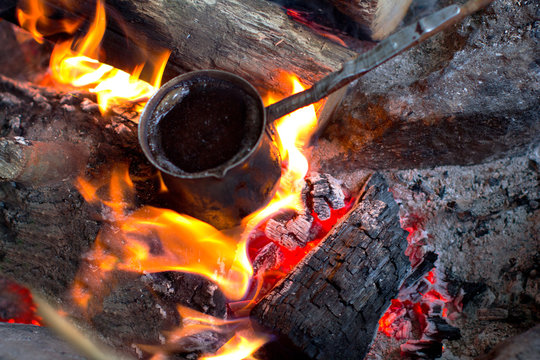 cezve on the burning bonfire