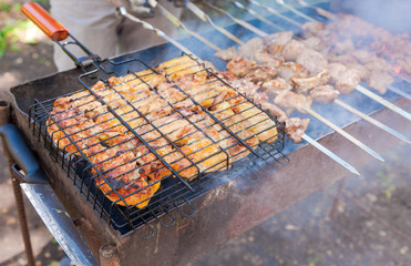 Appetizing fresh meat shish kebab prepared on a grill wood coal