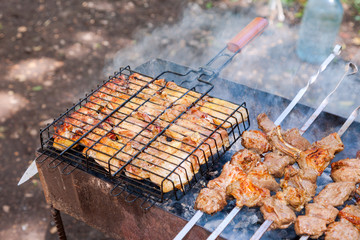 Appetizing fresh meat shish kebab prepared on a grill wood coal