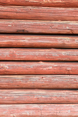 Fragment of red wooden wall as background