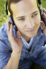 Man wearing headphones outdoors