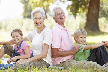 Grandparents with grandchildren in the country