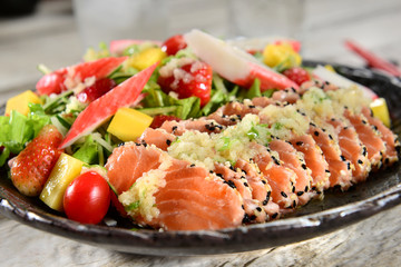 Spring salad with salmon sashimi