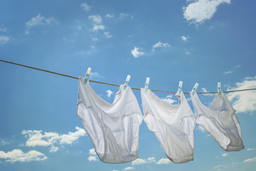 Men's underwear hanging on clothesline