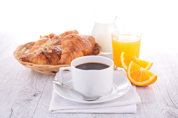 coffee, orange juice and croissant