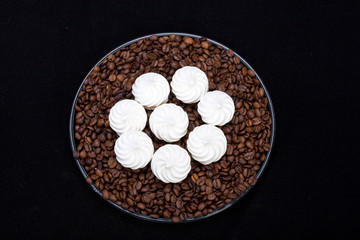 French vanilla meringue cookies and  coffee beans