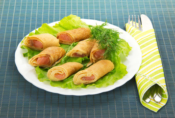 Flapjack with salmon and salad, cutlery