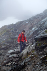 Fototapeta premium Teenage hiker on mountain