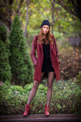 Young beautiful girl fashion shot / Autumn scene