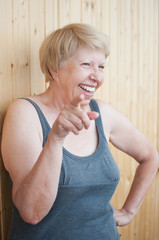 Fun laughing elderly woman portrait