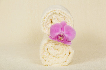 The towels roll decorated orchid