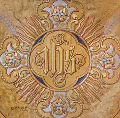 Mechelen - Detail of old catholic vestment - Monogram