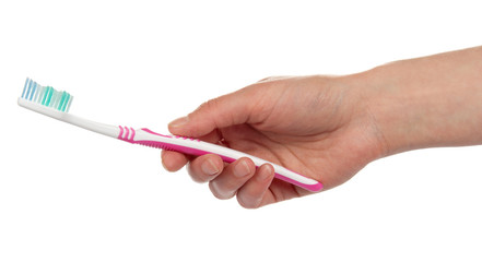 Toothbrush in the female hand